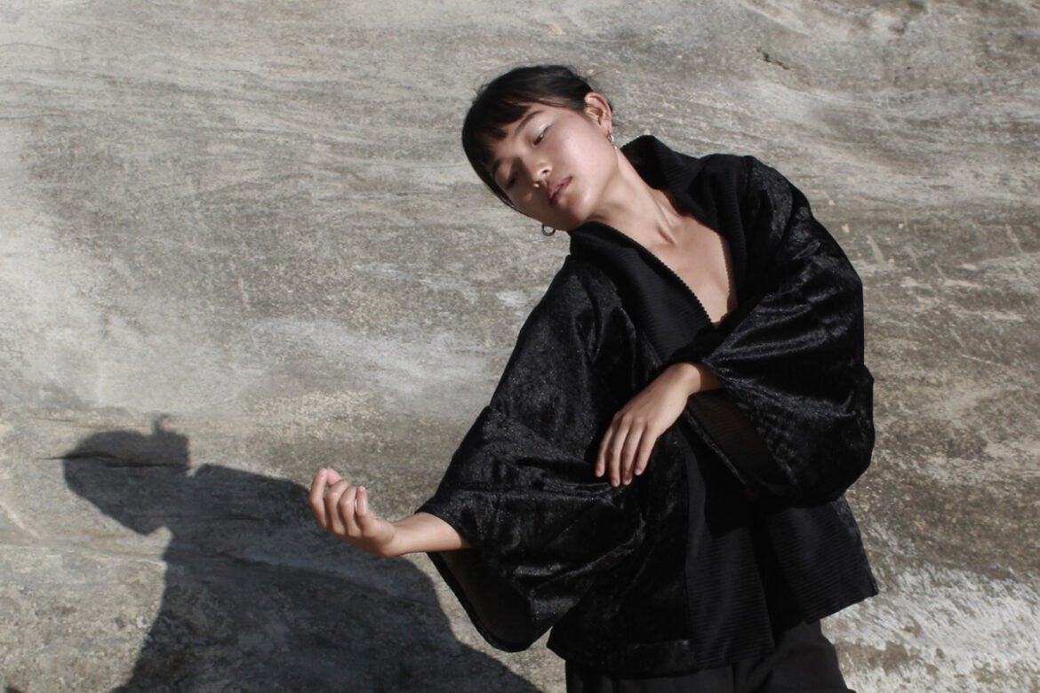 Model poses in one of Cristina Neves's kimonos. Photo Credits: Carlos Araújo